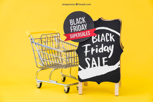 Free Mockup For Black Friday With Cart And Board Psd