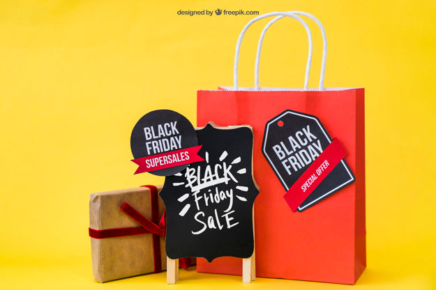 Free Mockup For Black Friday With Present And Bag Psd