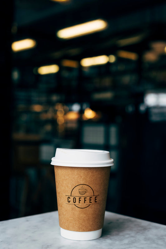 Free Mockup Of A Cup Of Takeaway Coffee Psd