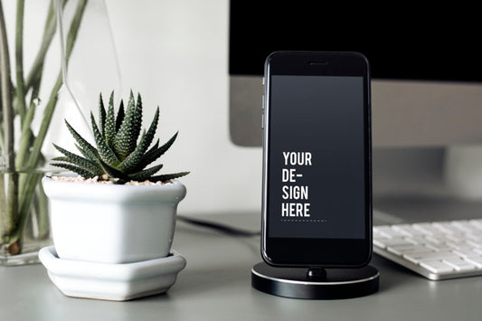 Free Mockup Of A Mobile Phone On A Stand Psd