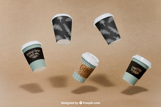 Free Mockup Of Flying Coffee Cups Psd