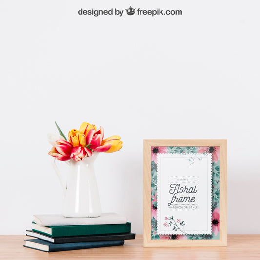 Free Mockup Of Frame Next To Plant On Books Psd