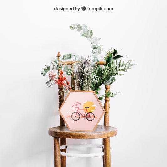 Free Mockup Of Frame On Chair With Flowers Psd