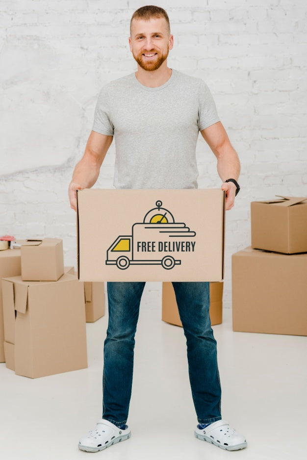 Free Mockup Of Man With Cardboard Boxes Psd