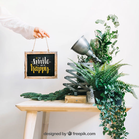Free Mockup Of Slate With Plants On Table Psd