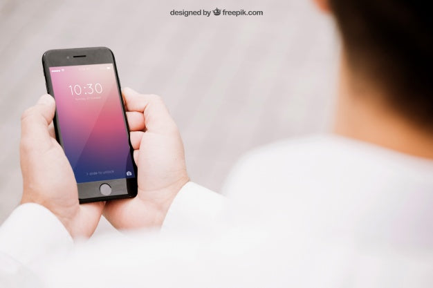Free Mockup Of Smartphone With Blurred Man Psd