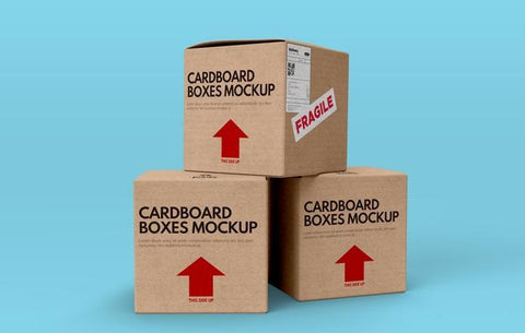 Free Mockup Of Three Cardboard Boxes On Blue Background Psd