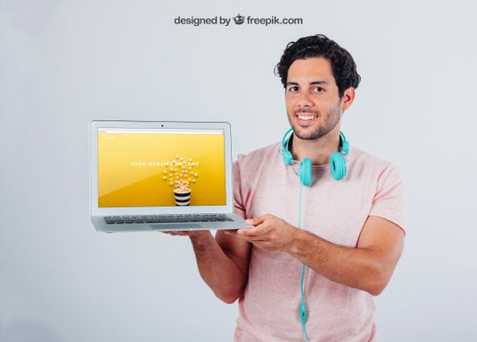 Free Modern Guy With Earphones And Laptop'S Mock Up Psd