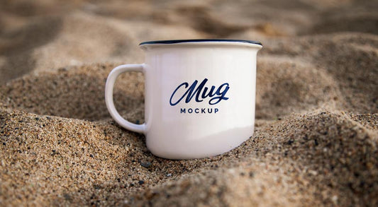 Free Mug In Sand Mockup Psd