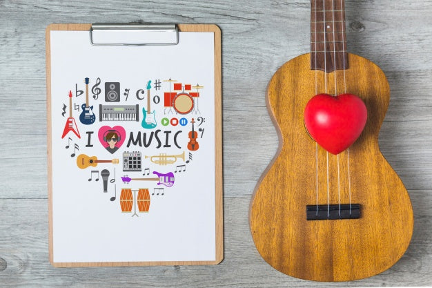 Free Music Mockup With Guitar And Clipboard Psd