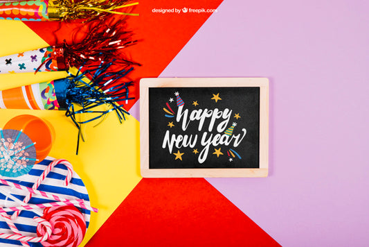 Free New Year Mockup With Slate And Confetti Psd