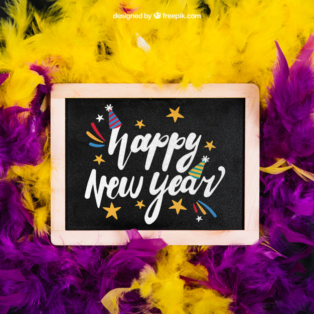Free New Year Mockup With Slate And Purple And Yellow Feather Psd
