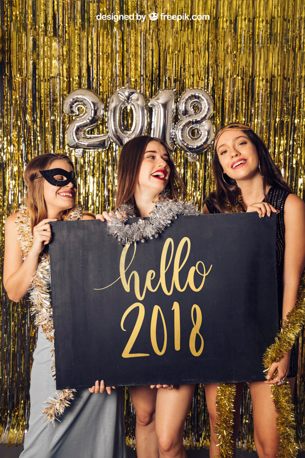 Free New Year Mockup With Three Girls Holding Board Psd
