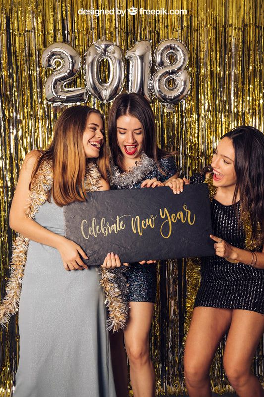 Free New Year Mockup With Three Girls Holding Small Board Psd