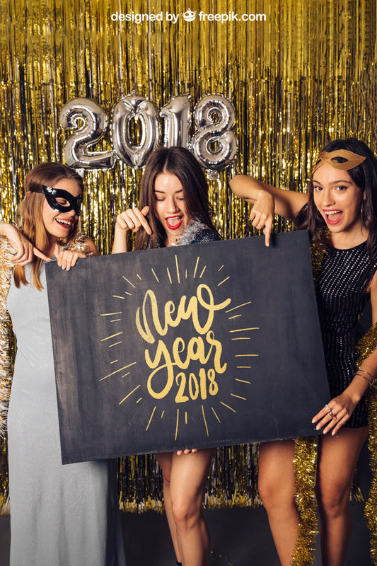 Free New Year Mockup With Three Girls Pointing At Board Psd