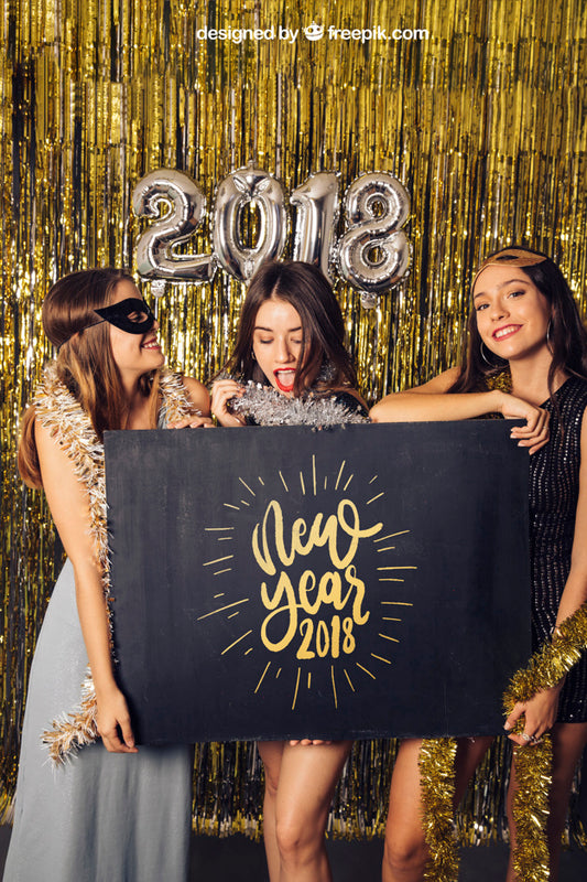 Free New Year Mockup With Three Girls Presenting Board Psd