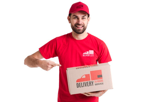 Free Non-Stop Delivery Man Pointing To A Box Psd