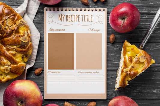 Free Notebook And Apple Pie On Table Psd