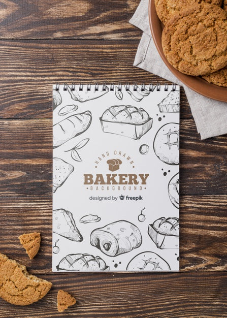 Free Notebook And Biscuits On Table Psd