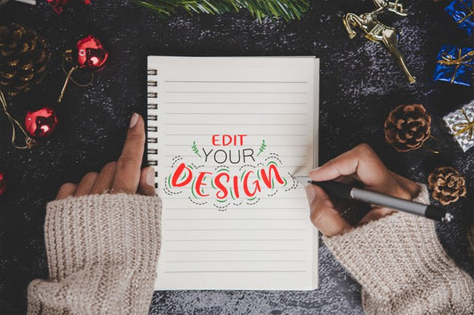 Free Notebook Mockup With Christmas Decoration Psd