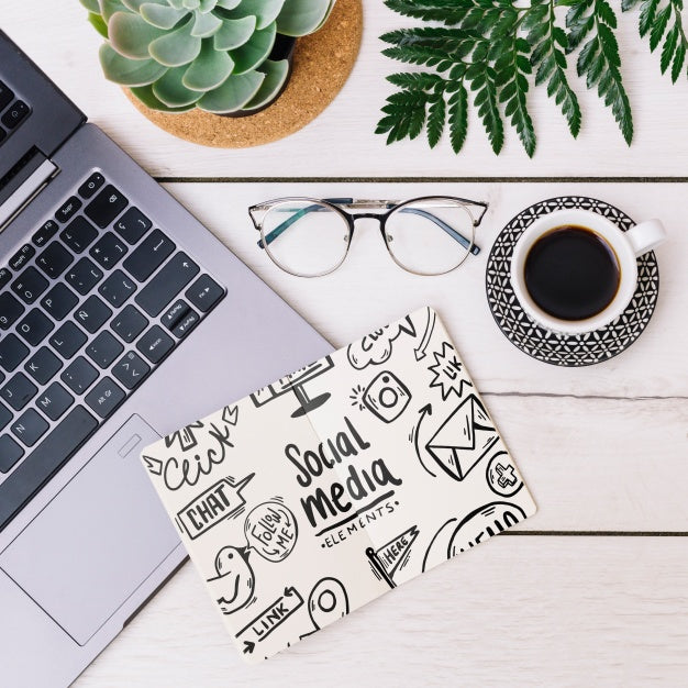 Free Notebook Mockup With Coffee And Laptop Psd