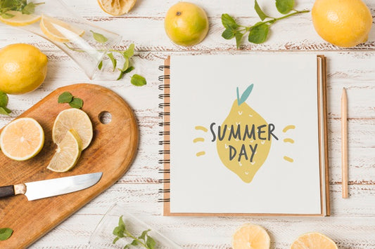 Free Notebook Mockup With Lemons For Summer Drink Psd
