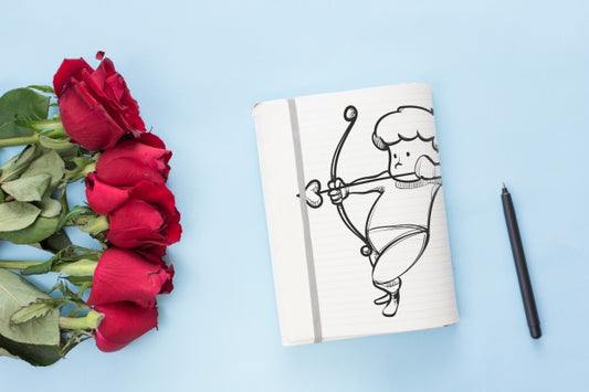 Free Notebook Mockup With Roses For Valentines Day Psd