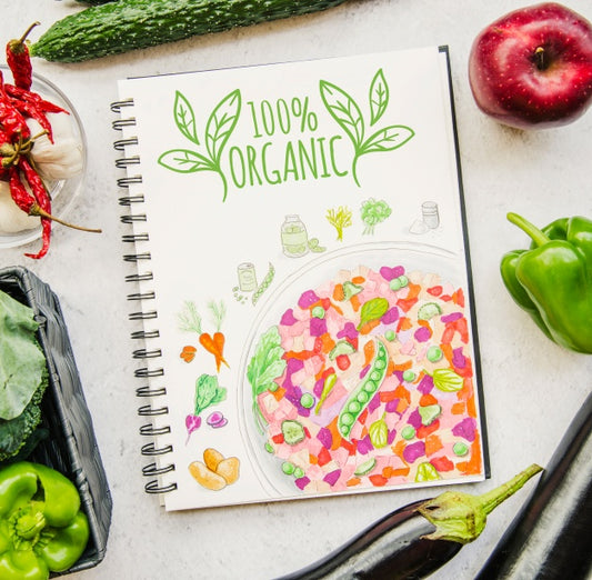 Free Notebook Mockup With Vegan Food Psd