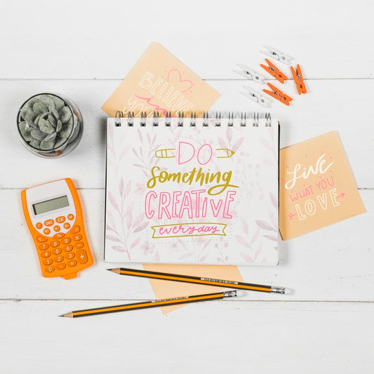 Free Notebook On Desk With Positive Quote Psd