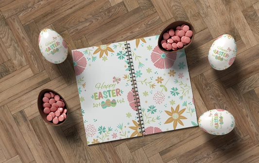 Free Notebook With Easter Eggs On Table Psd