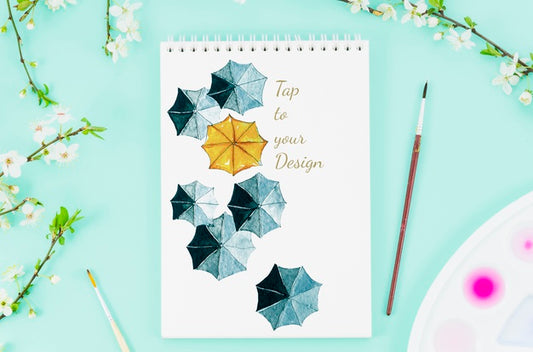 Free Notebook With Realistic Umbrellas Draw Psd