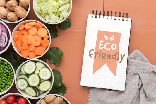 Free Notebook With Vegetables On Desk Psd