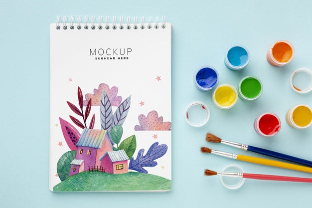 Free Notebook With Watercolors And Brushes Psd