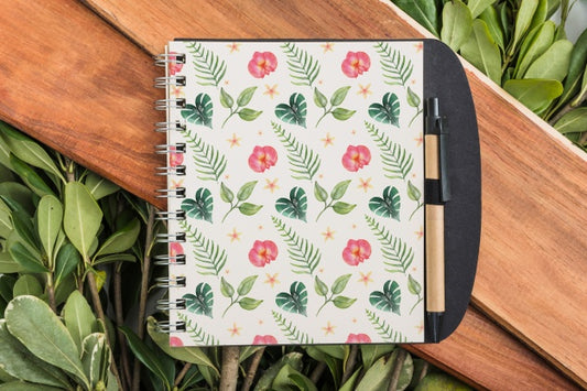Free Notepad Mockup With Tropical Leaves Psd