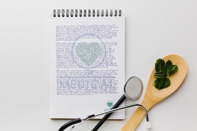 Free Notepad With Mint Leaves Flat Lay Psd