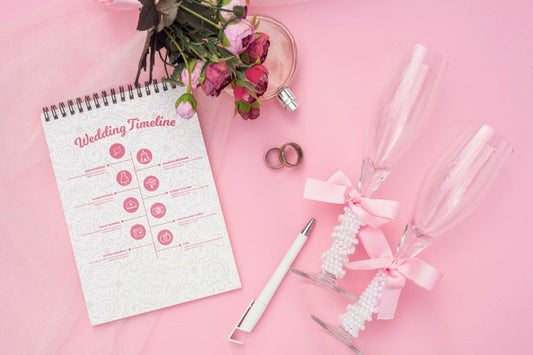 Free Notepad With Wedding Ideas And Glasses Of Champagne Psd