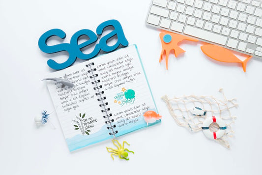 Free Ocean Day Notebook And Keyboard Concept Psd