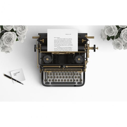 Free Old Typewriter On A Desktop With White Roses Psd