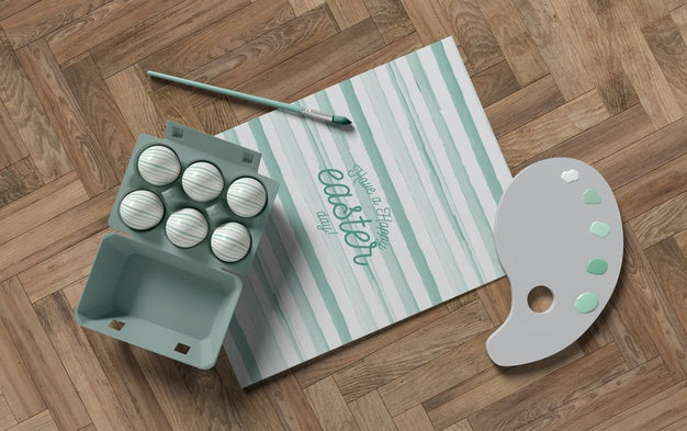 Free Painting Tools And Formwork With Eggs On Table Psd