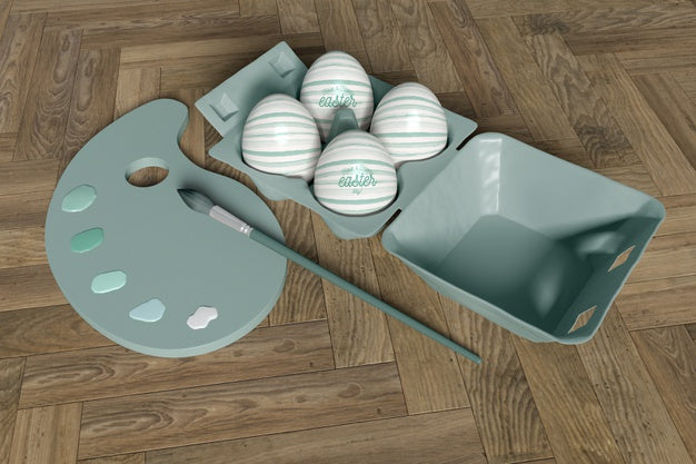 Free Painting Tools With Easter Eggs On Table Psd