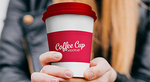 Free Paper Coffee Cup In Hand Mockup Psd