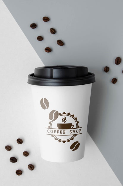 Free Paper Coffee Cup On Bicolored Background Psd