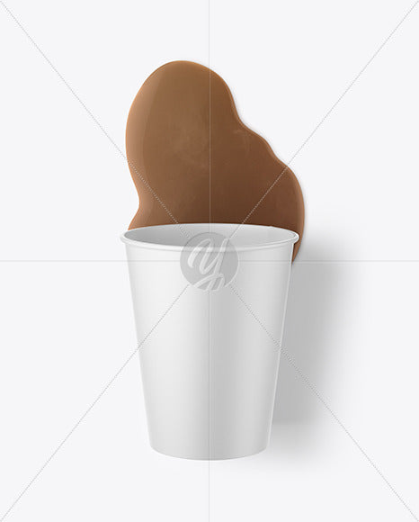 Free Paper Coffee Cup W/ Spilled Latte Mockup