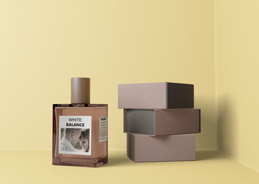 Free Perfume Beside Stack Of Boxes Psd
