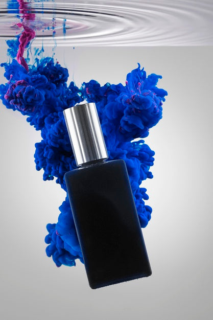 Free Perfume Bottle And Vivid Blue Smoke Mockup Psd