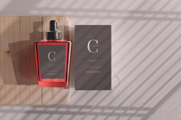 Free Perfume Bottle With Box Mockup Psd