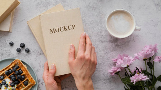 Free Person Holding A Mock-Up Book Psd