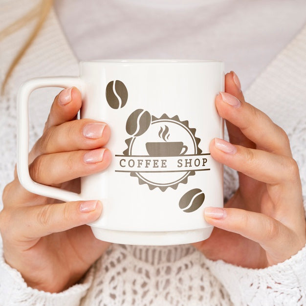 Free Person Holding White Mug Mock-Up Psd