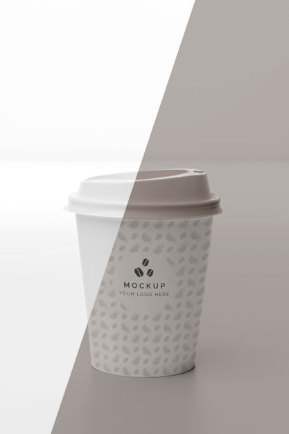 Free Plastic Cup With Coffee Mock Up On Table Psd