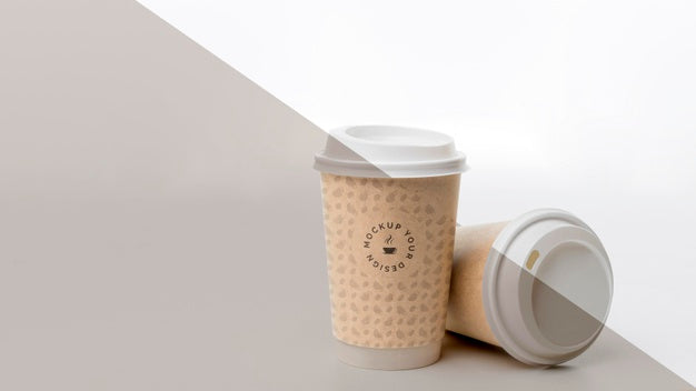 Free Plastic Cup With Coffee Mock Up On Table Psd